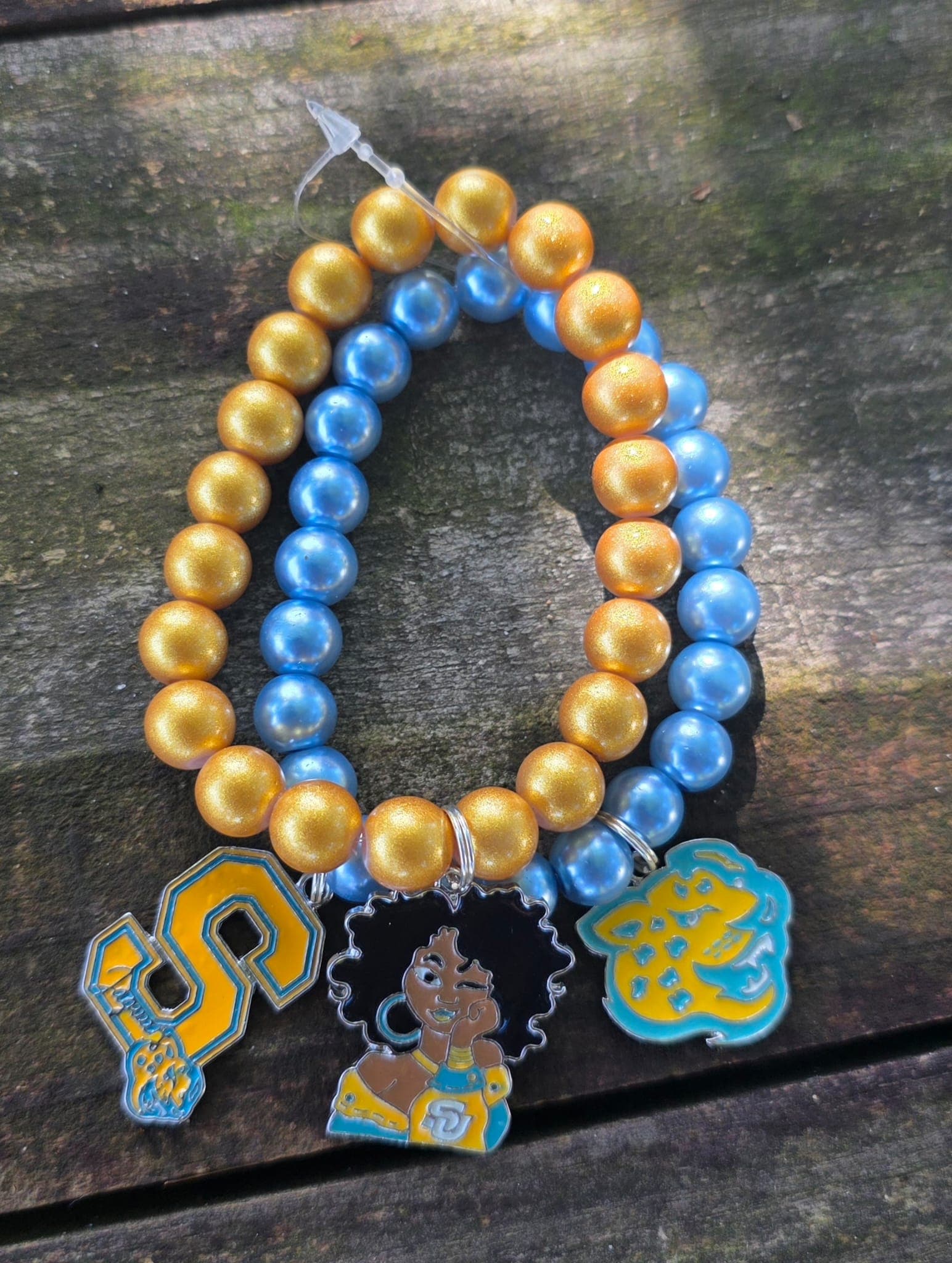 Light Blue and Gold Jaguar Charm Bracelet — image 1